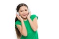 Little girl listen music modern headphones. Small kid listen music headphones. No ad interruptions. Play any song. Try