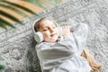 Little girl listening music lying on the floor Royalty Free Stock Photo