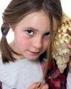 Little girl listening a shell Royalty Free Stock Photo