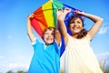 Little Girl And Little Boy Playing Kite Together Concept Royalty Free Stock Photo