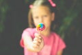 Little girl with lollipop - shallow depth of field