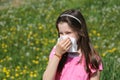 Little girl with long brown hair with allergy to the grasses blo Royalty Free Stock Photo