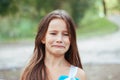 Little girl with long hair portrait, emotionally crying and upset, natural lighting outside Royalty Free Stock Photo