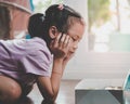 Little girl looking at box of donut wonder if she should eat Royalty Free Stock Photo