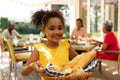 Little girl looking at camera and smiling Royalty Free Stock Photo