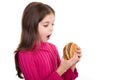 Little girl looking hamburger