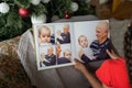 Little girl looking photobook at home. Close up shot. Family, childhood and leisure concept Royalty Free Stock Photo