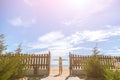 Little girl looks away in the background of the blue sky Royalty Free Stock Photo