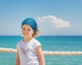 Little girl looks out to sea. Royalty Free Stock Photo