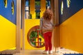 Little girl looks at the sky on a playground in the plane Royalty Free Stock Photo