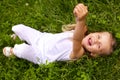 Little girl lying on grass Royalty Free Stock Photo