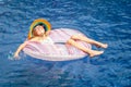 Little girl lying on the inflatable rubber circle
