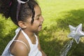 LIttle girl with magic star wand