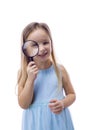 Little girl with magnifying glass on white background. Royalty Free Stock Photo