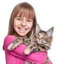 Little girl with Maine Coon kitten Royalty Free Stock Photo