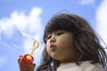 Little girl making bubbles Royalty Free Stock Photo