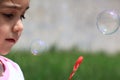 Little girl making bubbles Royalty Free Stock Photo