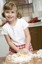 Little girl making cookies