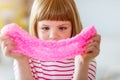 Girl making homemade slime toy