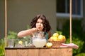 Little girl making lemonade Royalty Free Stock Photo