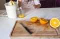 Little girl making orange juice Royalty Free Stock Photo