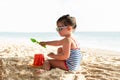 Little Girl Making Sand Castle On Beach Royalty Free Stock Photo