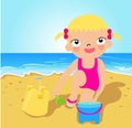 Little girl making sand castle at tropical beach Royalty Free Stock Photo