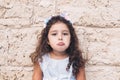 Little girl making teasing with sad face Royalty Free Stock Photo