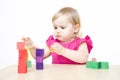 Little girl making towers Royalty Free Stock Photo