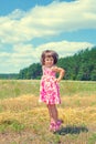 Little girl in the meadow