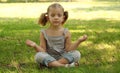 Little girl meditating