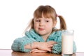 The little girl with a milk glass Royalty Free Stock Photo