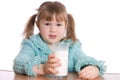 The little girl with a milk glass Royalty Free Stock Photo