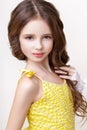 Little girl model in studio on white background Royalty Free Stock Photo