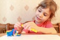Little girl models from plasticine Royalty Free Stock Photo