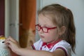 Little girl with money box. Royalty Free Stock Photo