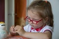 Little girl with money box. Royalty Free Stock Photo