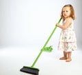 Little girl with mop Royalty Free Stock Photo