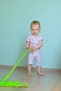 Little girl mopping the floor Royalty Free Stock Photo