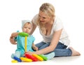 Little girl and mother with color pyramidion Royalty Free Stock Photo