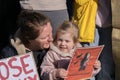Little Girl And Mother At The Protest Against The War In Ukraine At Amsterdam The Netherlands 27-2-2022