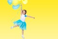 Little girl with multicolored balloons. Royalty Free Stock Photo