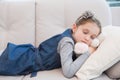 Little girl napping on the couch Royalty Free Stock Photo