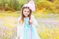 Little girl on the nature with butterfly net Royalty Free Stock Photo