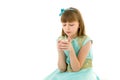 Little girl in a New Year costume with a candle. Royalty Free Stock Photo