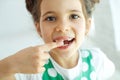 Little girl with no tooth. The child lost a tooth.