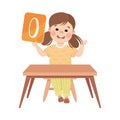 Little Girl with Number Zero Sitting at Desk Showing Card with Numeral Vector Illustration