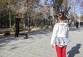 Little girl observes a juggler with crystal balls shows