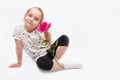 Little girl offering a rose isolated on white background Royalty Free Stock Photo