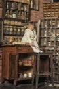 Little girl on the old kitchen